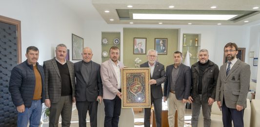 BOLİMDER Başkanı Altundağ ve Dernek Üyeleri, Rektör Alişarlı’yı Ziyaret Etti